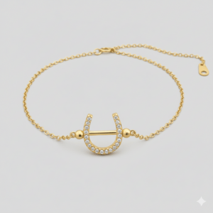Goudkleurige hoefijzerarmband met zirkonia